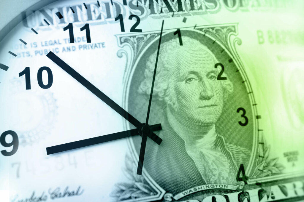 Dollar bill with overlay image of a clock on top